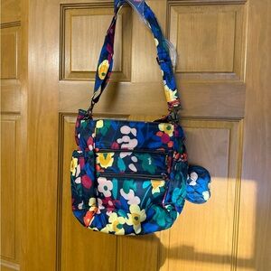 Lug Toss Crossbody In Wildflower Bag and heart pouch